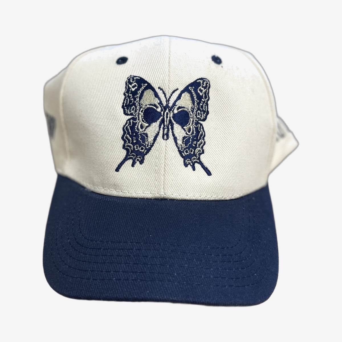 Custom embroidered cap — butterfly skull design